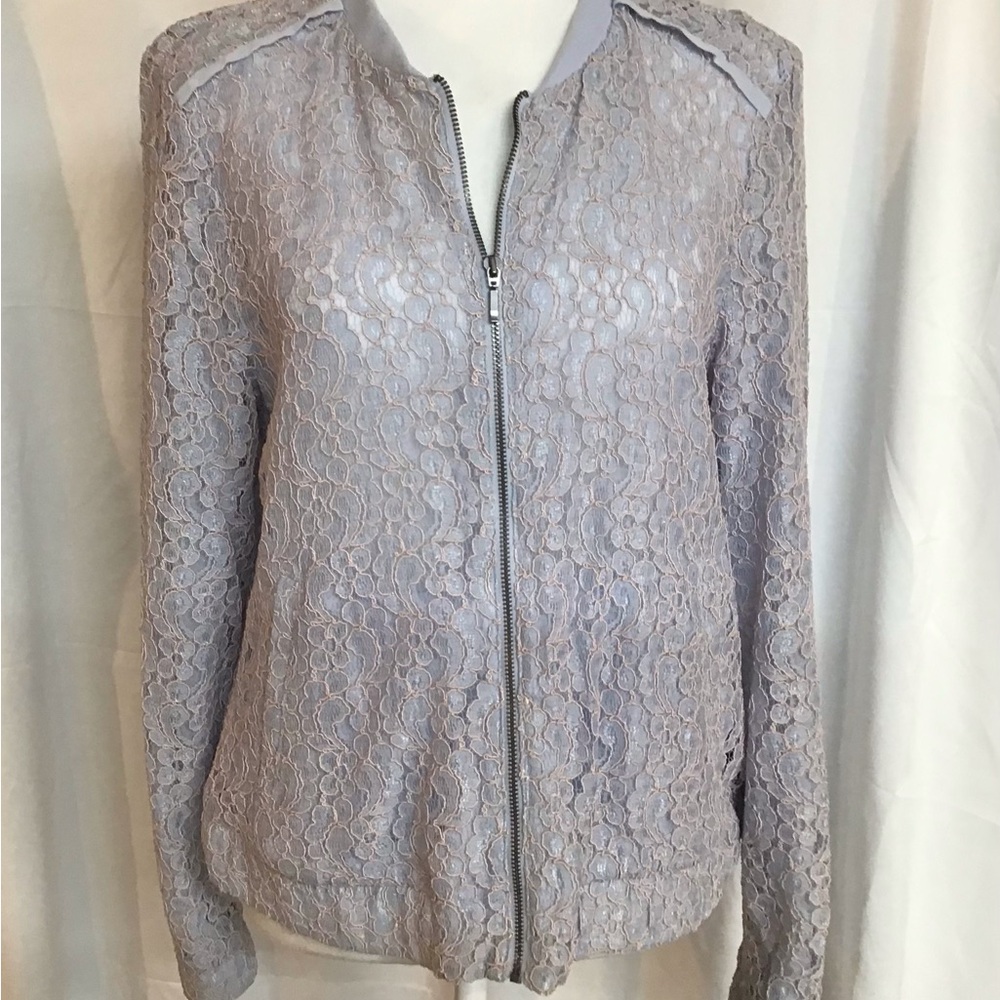 Lauren Conrad Light blue feminine semi sheer zip jacket.
